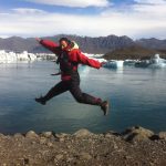 Man-jumping-in-glacier-lake-iceland